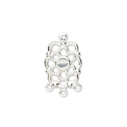A silver filigree charm pendant with a central oval cutout and decorative loops, shown on a plain white background.