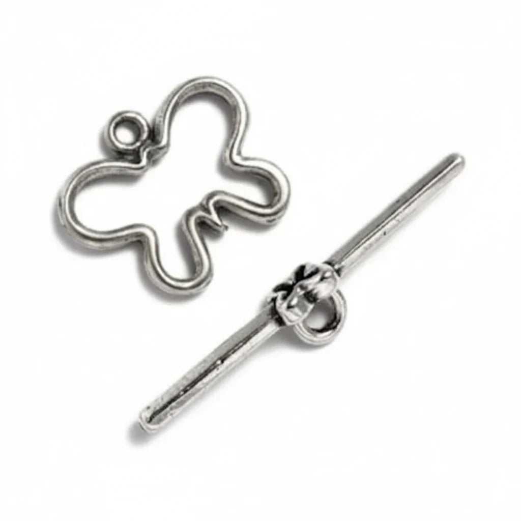 Silver-toned toggle clasp with a butterfly-shaped ring and a straight bar, shown on a plain white background.