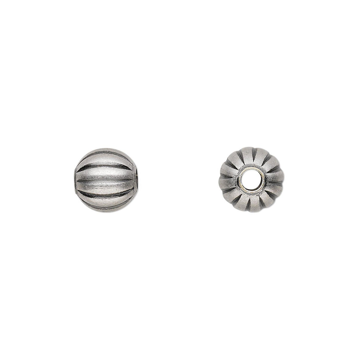 Two silver-toned metal beads shown on a plain white background, one viewed from the side with a ribbed texture and one from the top showing a fluted, scalloped edge and central hole.