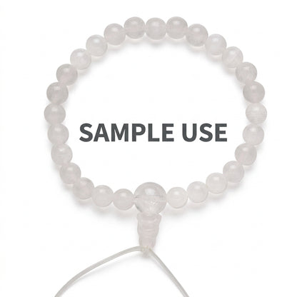 A translucent white beaded bracelet with a clear connector and cord, shown on a plain white background with black text reading '*Sample Usage IV'.