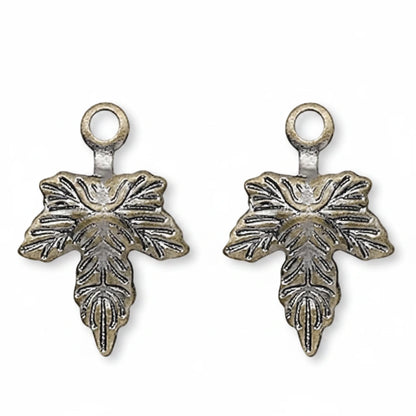Three identical small metal charms with a leaf-like embossed design and a top loop, shown on a plain white background.