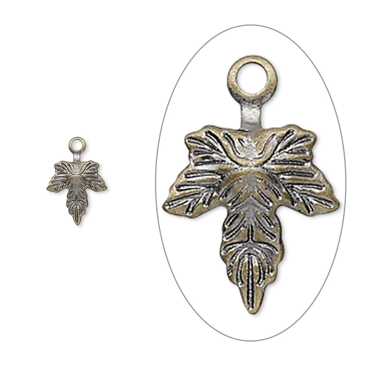 An antique silver-toned metal leaf-shaped charm with a hanging loop, shown alongside a smaller inset view of the same charm on a plain white background.