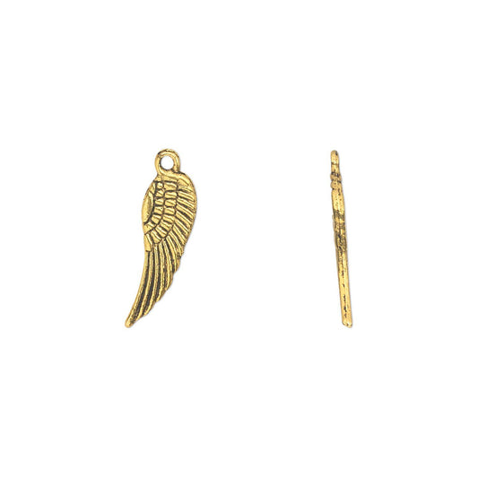 A gold-toned metal angel wing charm shown next to a matching straight pin on a plain white background.