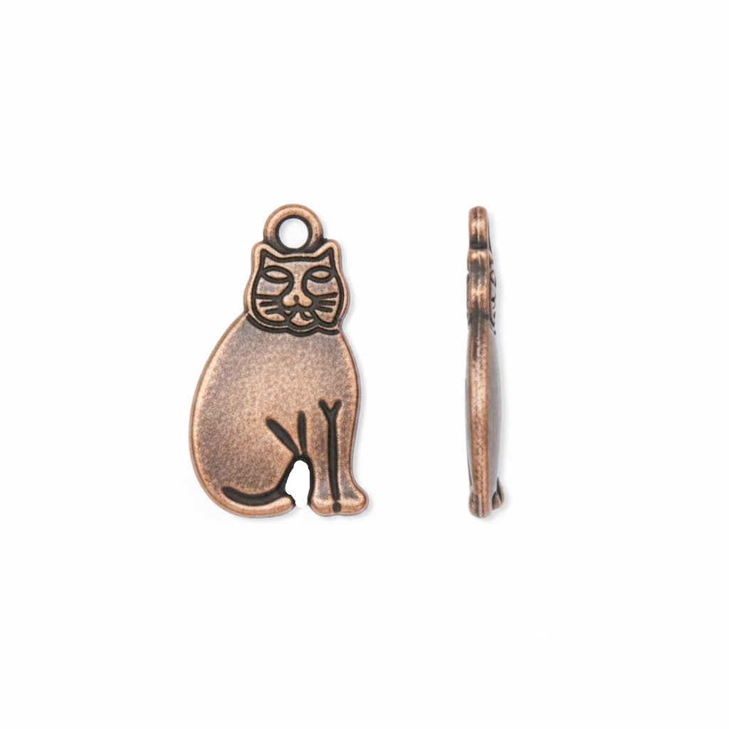 An antique bronze metal charm shaped like a sitting cat, shown from both the front and side profiles on a clean white background.