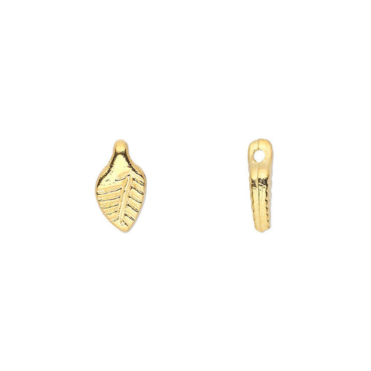 Two small gold-toned leaf-shaped jewelry charms shown on a plain white background, one front-facing and one side-facing.