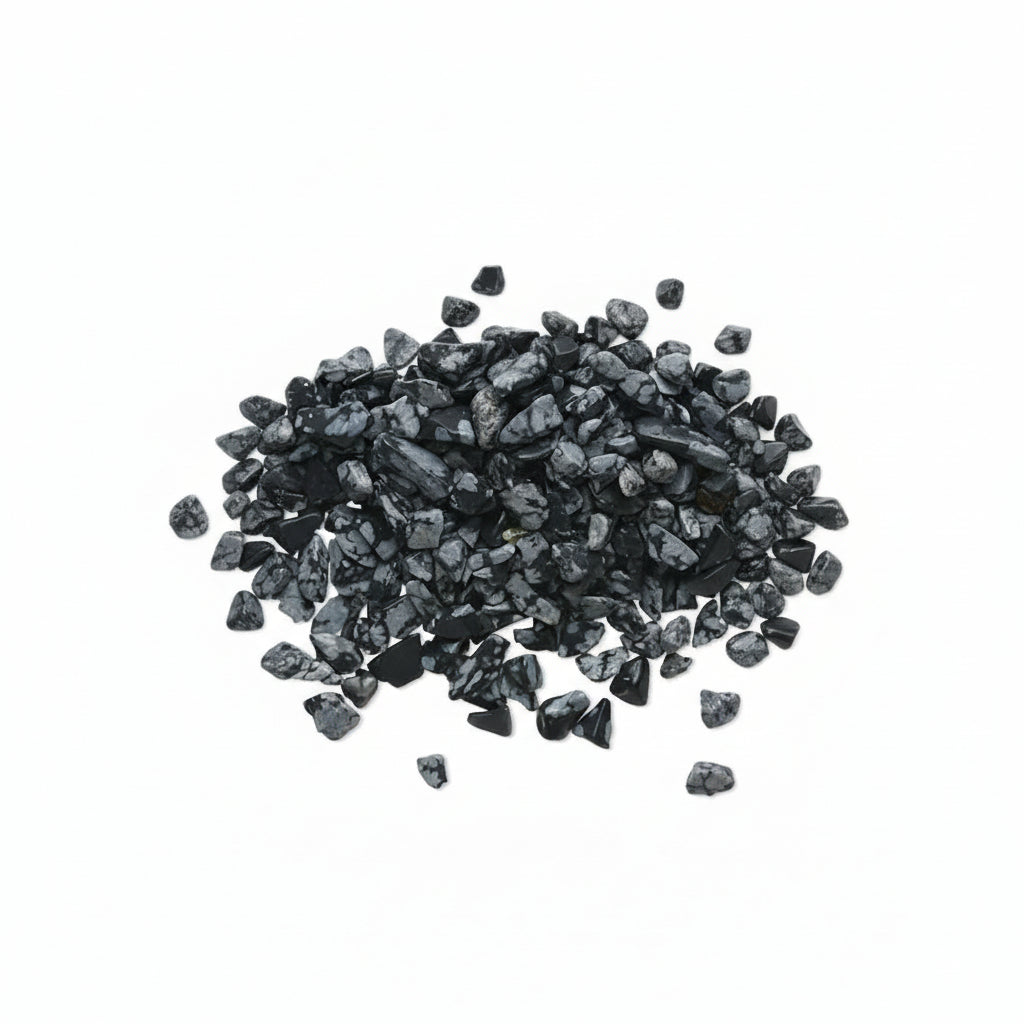 Close-up of dark gray pebbles on a white background