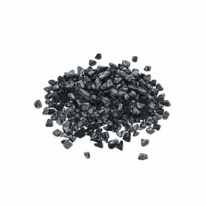 Close-up of dark gray pebbles on a white background