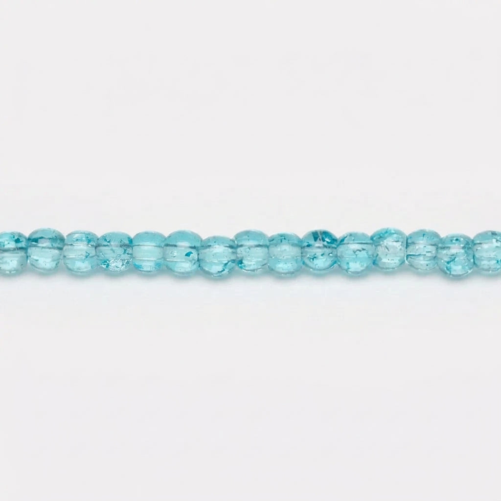 Light blue faceted glass beads shown as a strand with a circular close-up inset highlighting their transparent, bubbly texture.