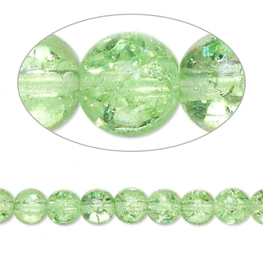 Light green faceted round beads shown in a close-up oval detail and as a strand on a white background.