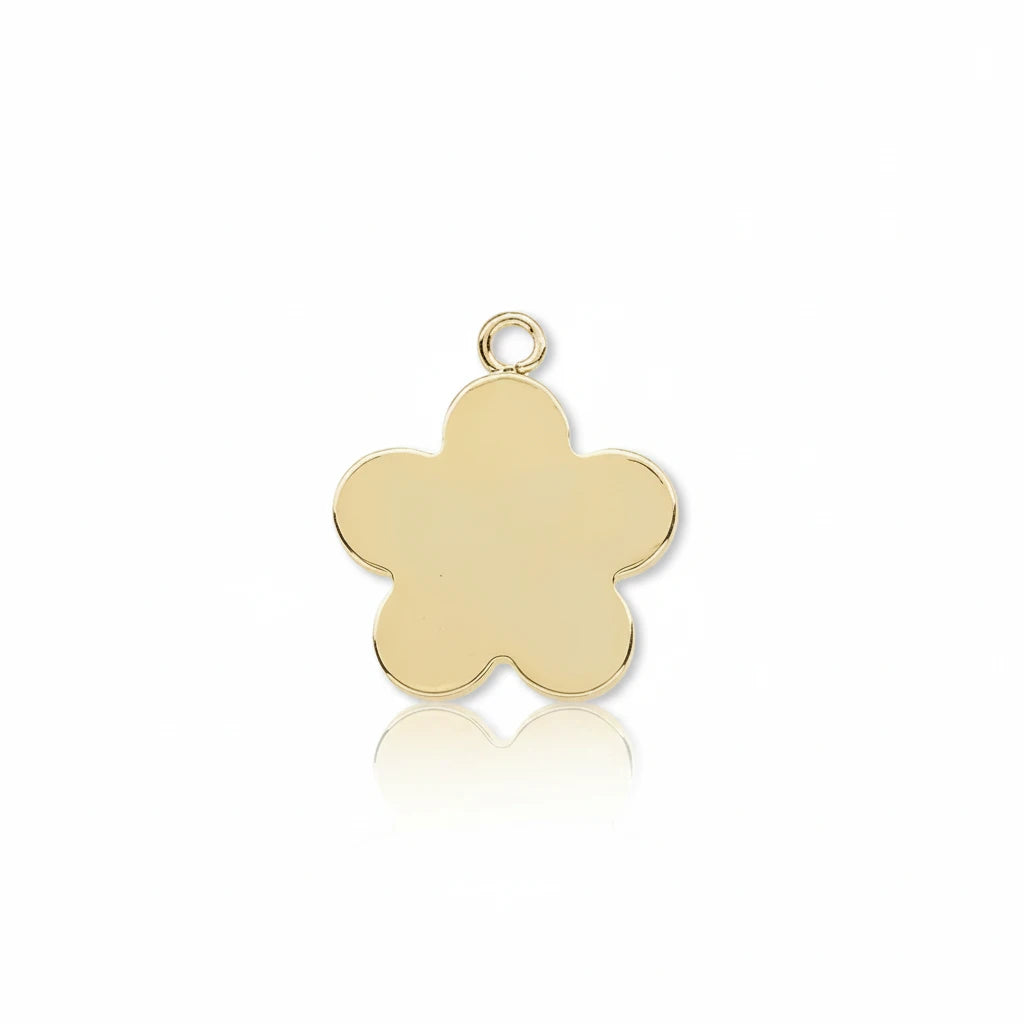 A small gold flower-shaped charm with a top loop, shown on a plain white background.