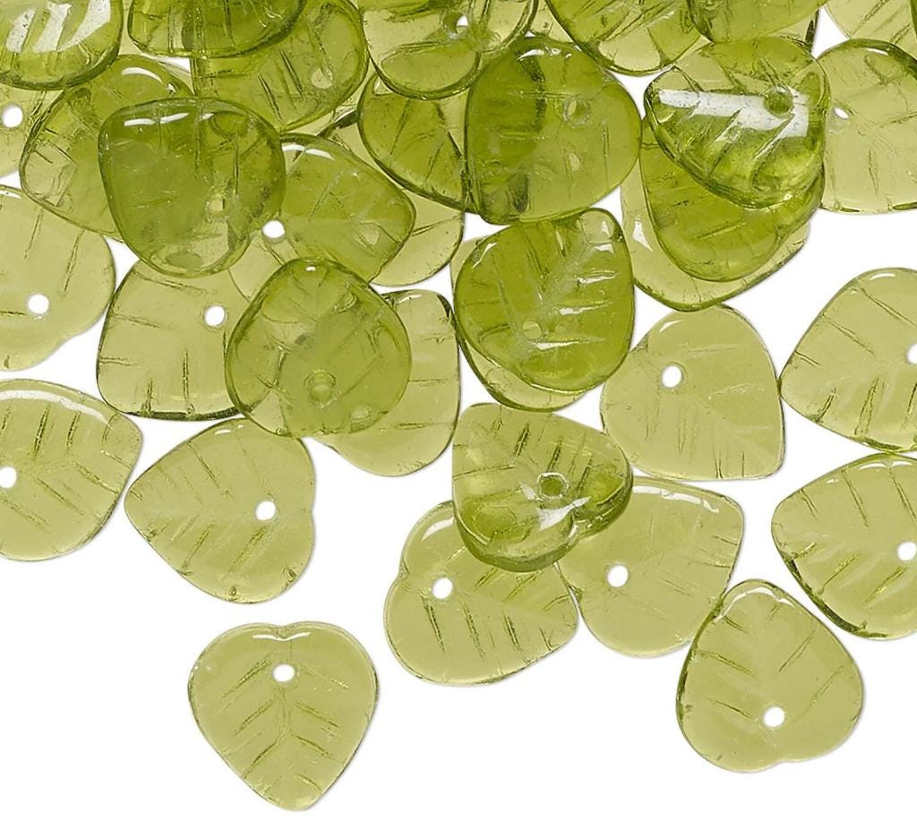 Green leaf-shaped beads on a white background