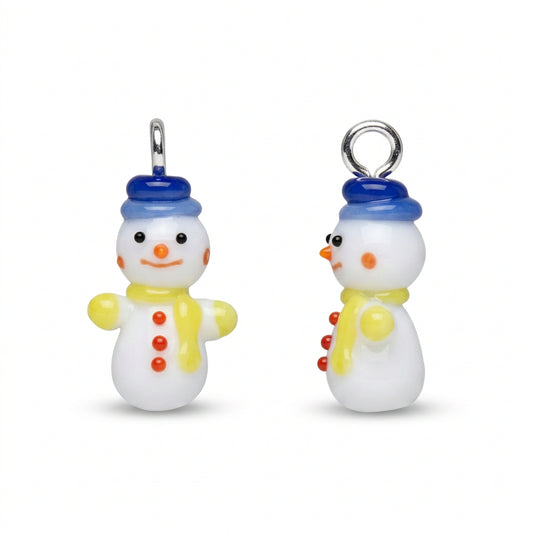 Two small snowman charms on a plain white background, one shown from the front and one from the side. The snowmen are white with blue hats, yellow scarves and hands, orange buttons, and black facial features.