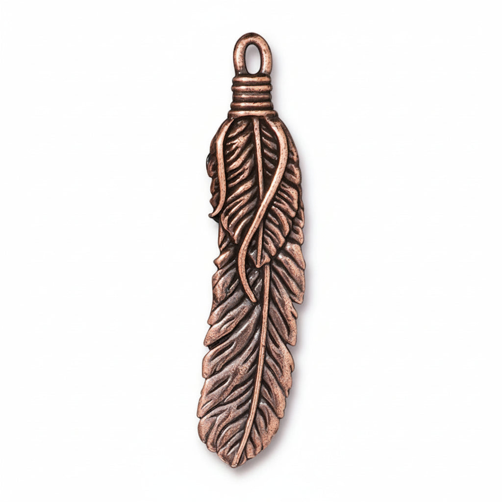 A single copper-colored feather pendant charm with detailed leaf-like textures and a wrapped top loop, shown on a plain white background.