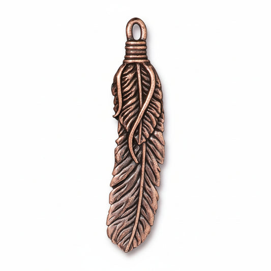 A single copper-colored feather pendant charm with detailed leaf-like textures and a wrapped top loop, shown on a plain white background.