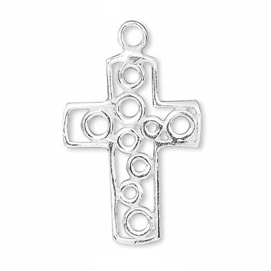 A silver-toned metal cross pendant with openwork circular cutouts and a top loop, shown on a plain white background.