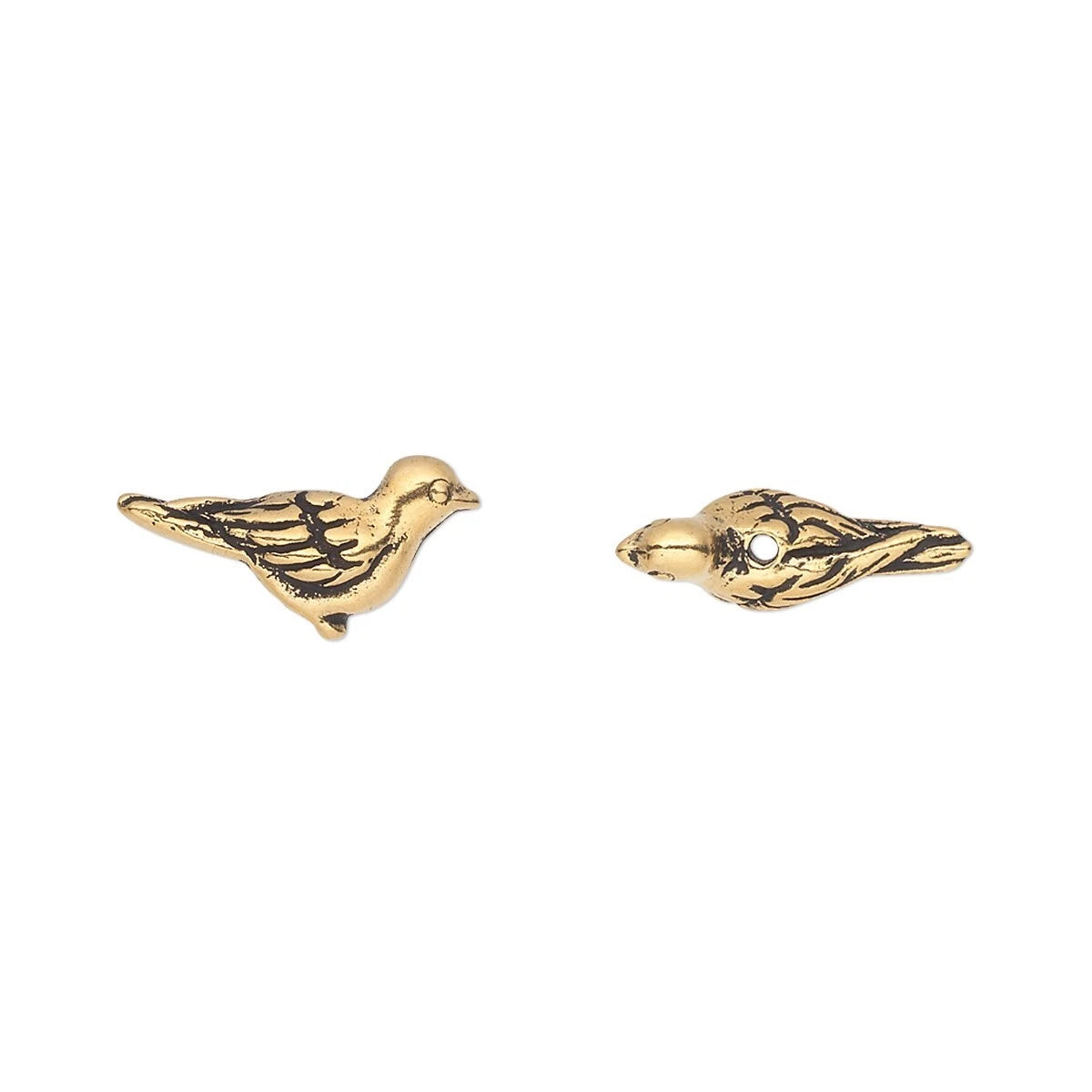 A pair of gold bird stud earrings with dark antiqued detailing and a small clear stone on one earring, shown on a plain white background.