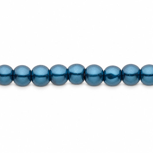 A close-up horizontal line of blue round beads on a plain white background.