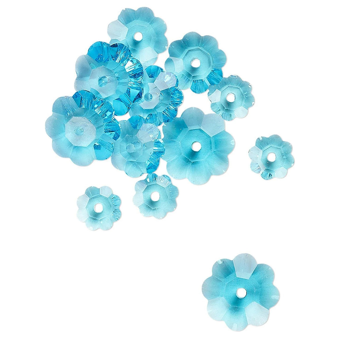 A group of light blue translucent flower-shaped beads with a central hole, scattered on a plain white background.