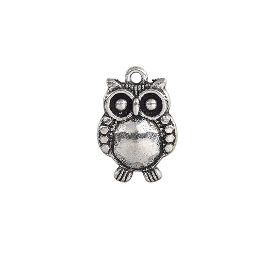 An antique silver owl charm pendant with a textured finish and a top loop, shown on a plain white background.