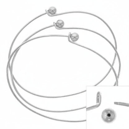 Three thin silver wire hoop bracelets with small polished ball charms, shown on a white background with a small inset detail view of the clasp.