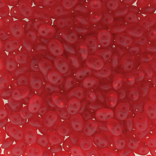 A close-up, top-down view of numerous small, translucent red seed beads with a double hole, filling the entire frame.