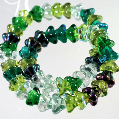 green flower beads design on a white background