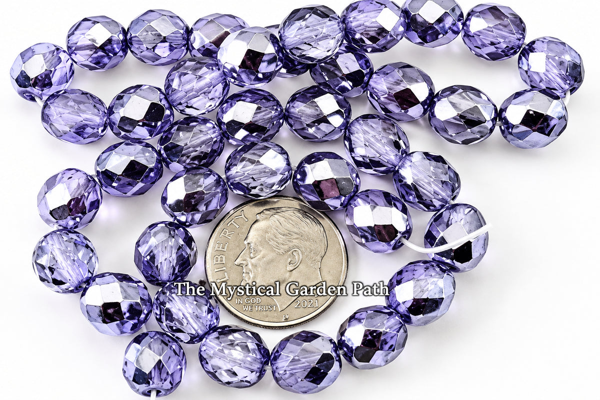 Faceted round beads in a periwinkle or lavender-blue color, arranged around a US quarter coin for scale, on a plain white background with a watermark text overlay.