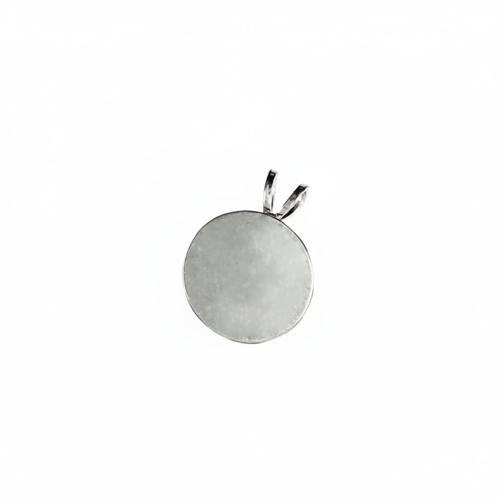A round silver pendant with a bail at the top, shown on a white background with the text 'The Mystical Garden Path' at the bottom.