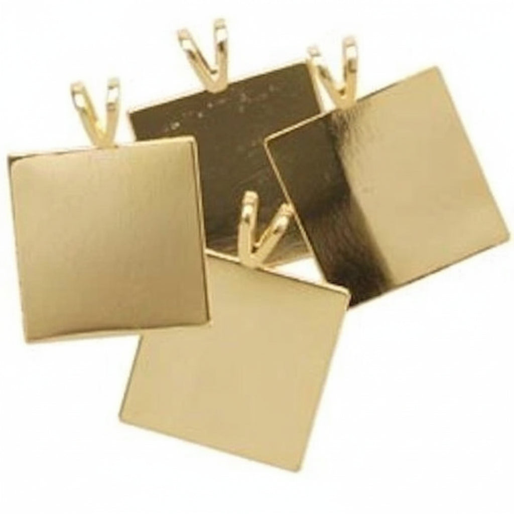Four blank square gold-tone metal pendant charms with hanging loops, arranged on a plain white background.