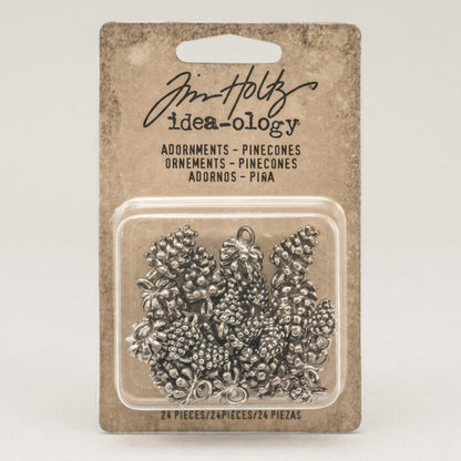 Tim Holtz Idea-Ology pinecone ornaments packaging on a white background