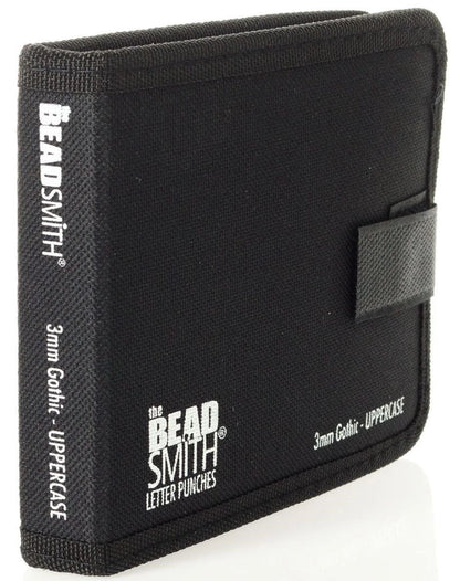 Black canvas letter punch case for 3mm Gokil - Upper Case by The Bead Smith, featuring white printed branding and a black elastic closure tab on the front.