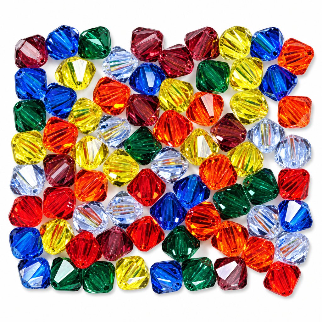 A pile of faceted crystal beads in assorted colors including blue, green, yellow, red, orange, and clear, arranged on a plain white background.