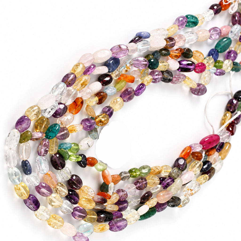 Multiple strands of polished multicolor gemstone beads draped in a circle, with a US quarter coin placed in the center for scale, on a plain white background.