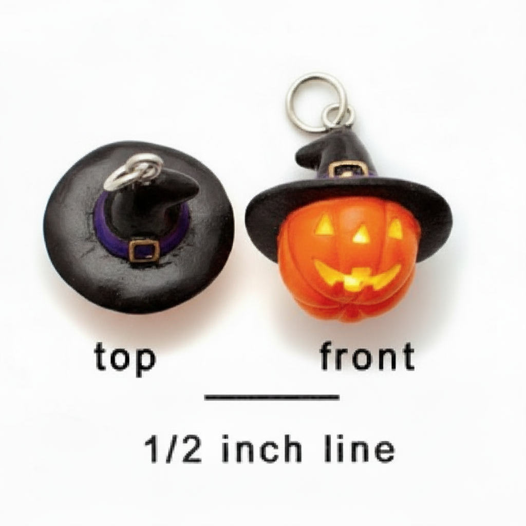 Two small Halloween-themed charms shown on a white background, labeled top and front, with a 1/2 inch line indicating scale. One charm is a jack-o'-lantern pumpkin wearing a black witch hat with a purple band, and the other is a carved orange pumpkin wearing a black witch hat with a gold band.