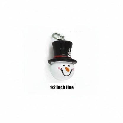 A small snowman charm with a black top hat, white face, and orange carrot nose, shown on a plain white background with the text '1/2 inch line' below it.