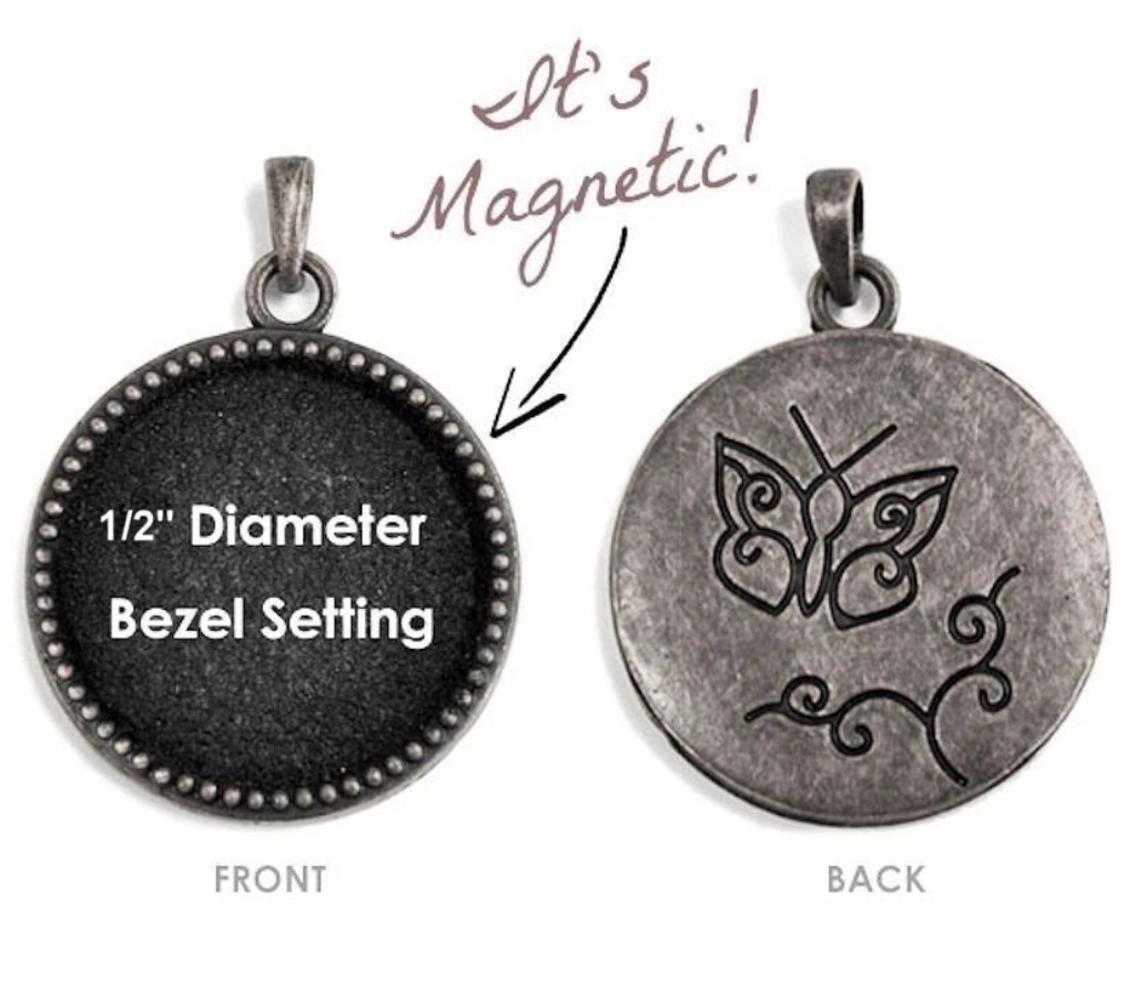 A 1/2" diameter bezel-set pendant shown from both front and back on a white background. The front is dark charcoal/black with white text reading '1/2" Diameter Bezel Setting,' and the back is a distressed silver-gray with an engraved butterfly design.