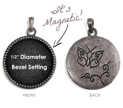 A 1/2" diameter bezel-set pendant shown from both front and back on a white background. The front is dark charcoal/black with white text reading '1/2" Diameter Bezel Setting,' and the back is a distressed silver-gray with an engraved butterfly design.