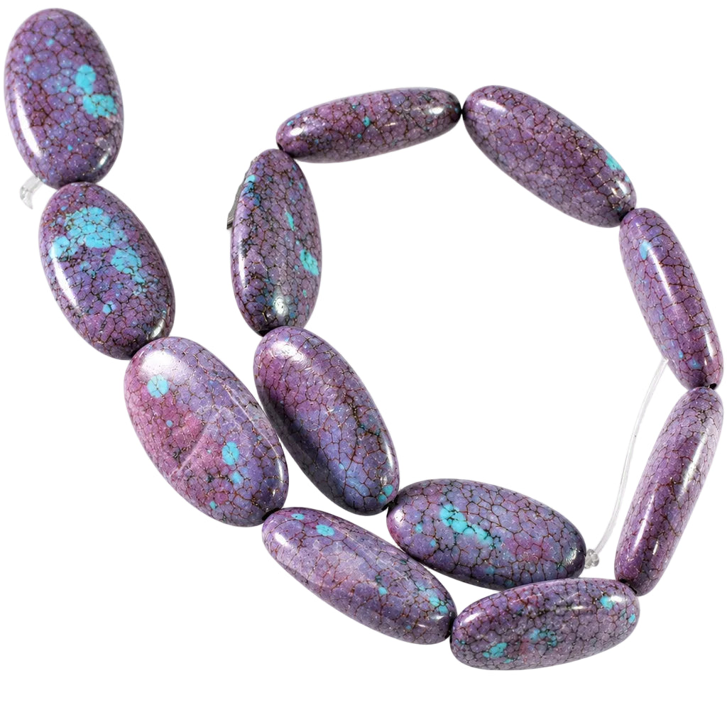 Purple polished stone beads with turquoise matrix inclusions, shown on a white background with a coin for scale.