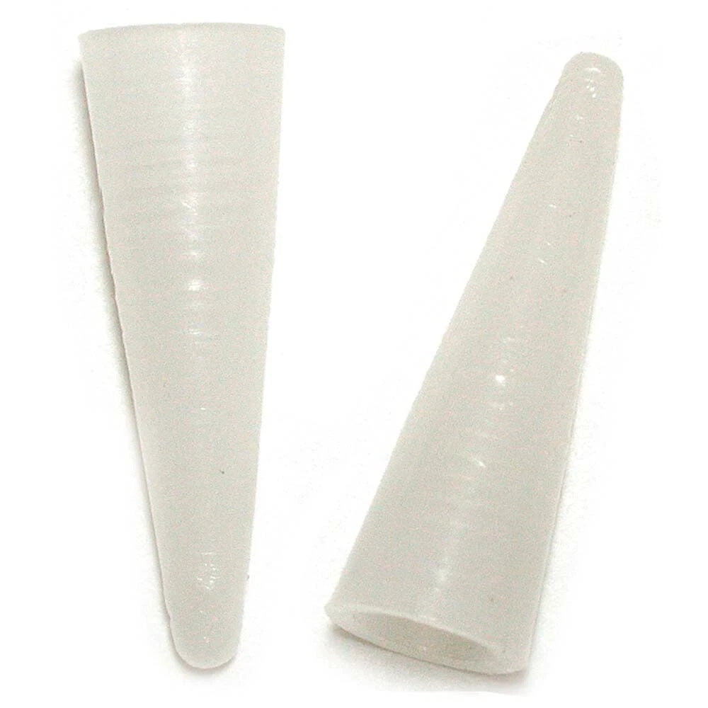 Two white ceramic cones on a white background