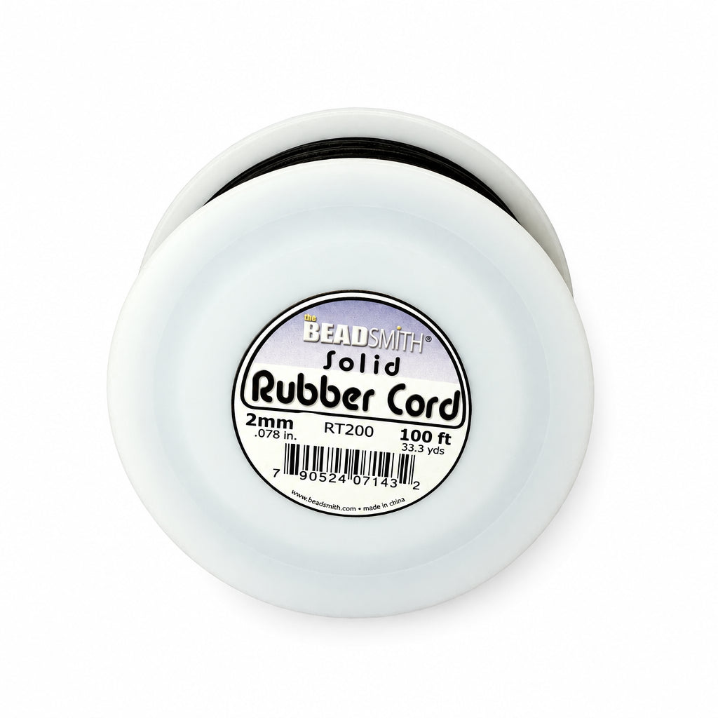 A spool of BeadSmith Solid Rubber Cord, 2mm (0.078 in) and 100 ft, shown against a plain white background.