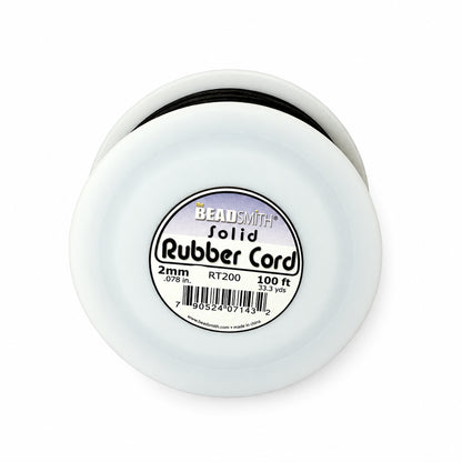 A spool of BeadSmith Solid Rubber Cord, 2mm (0.078 in) and 100 ft, shown against a plain white background.