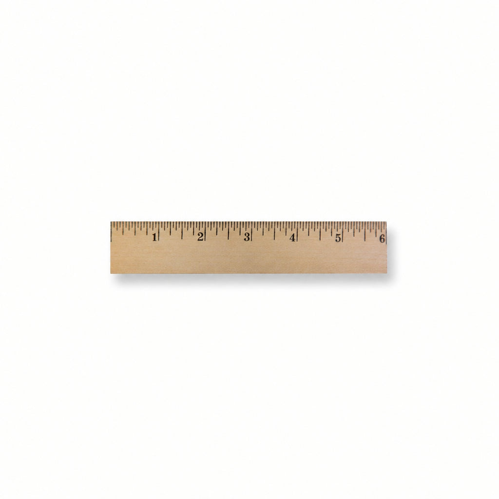 A wooden ruler with black printed inch markings, shown horizontally against a plain white background.