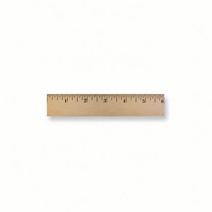 A wooden ruler with black printed inch markings, shown horizontally against a plain white background.