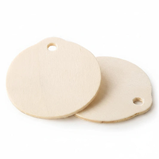 Two blank round wooden craft tags with pre-drilled holes, displayed on a clean white background.