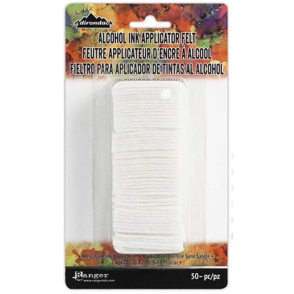 Ranger Adirondack's Alcohol Ink Applicator Felt in white, packaged in a clear plastic blister pack with a white cardboard backing featuring colorful text and graphics.