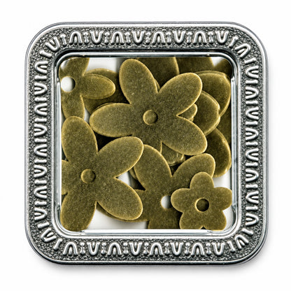 A square metal tin with a decorative embossed border and a clear top, containing several small flower-shaped metallic embellishments or charms in a warm metallic gold tone, shown on a white background.