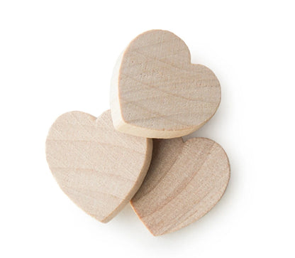 Three small unfinished wooden heart-shaped pieces with visible grain, arranged on a plain white background.