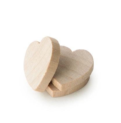 Three small unfinished wooden heart-shaped blocks stacked together on a white background.