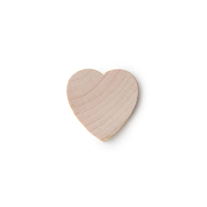 A small, heart-shaped wooden piece with natural light wood grain, centered on a plain white background.