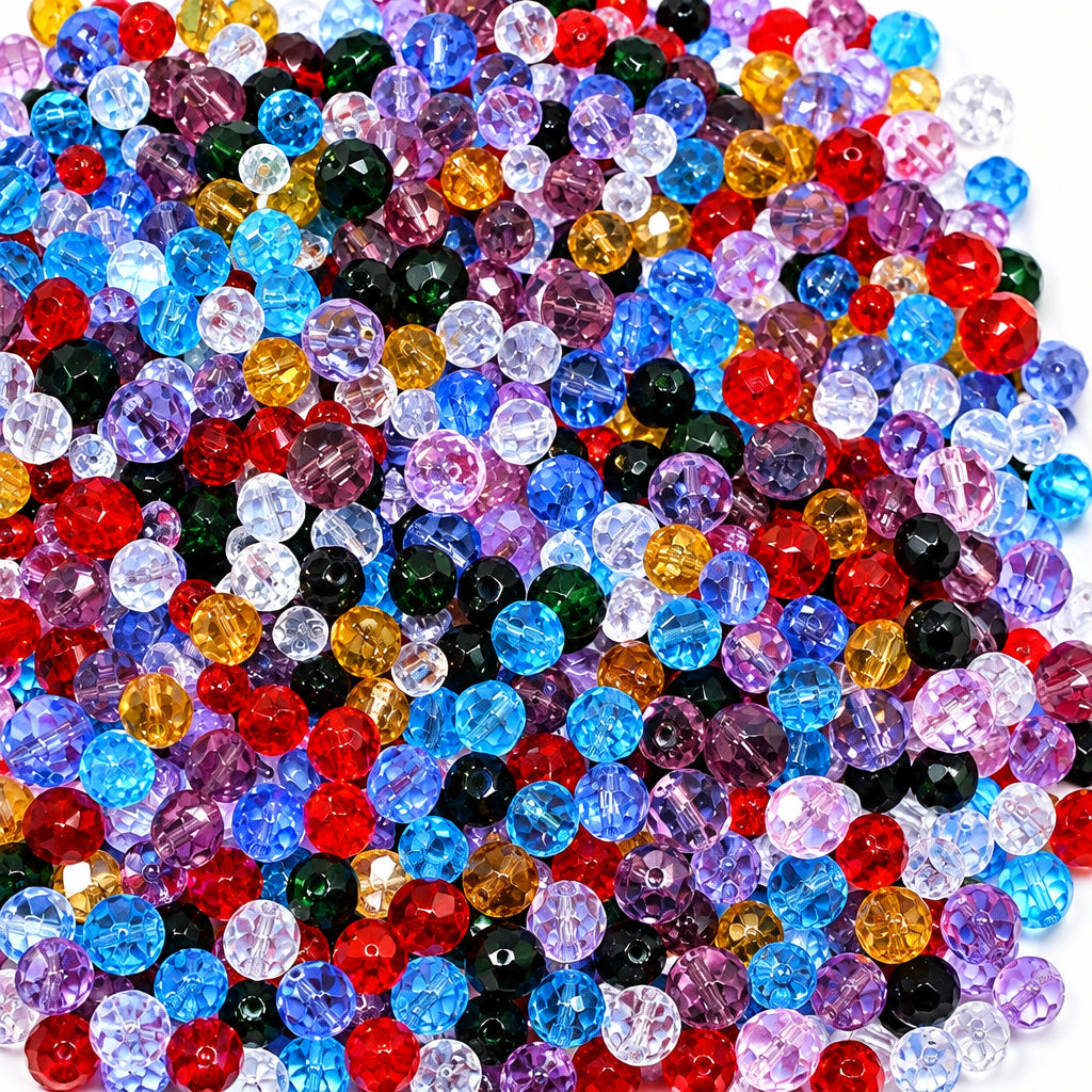 A close-up pile of faceted round beads in many colors, including blue, red, purple, pink, black, clear, and amber, filling the frame.